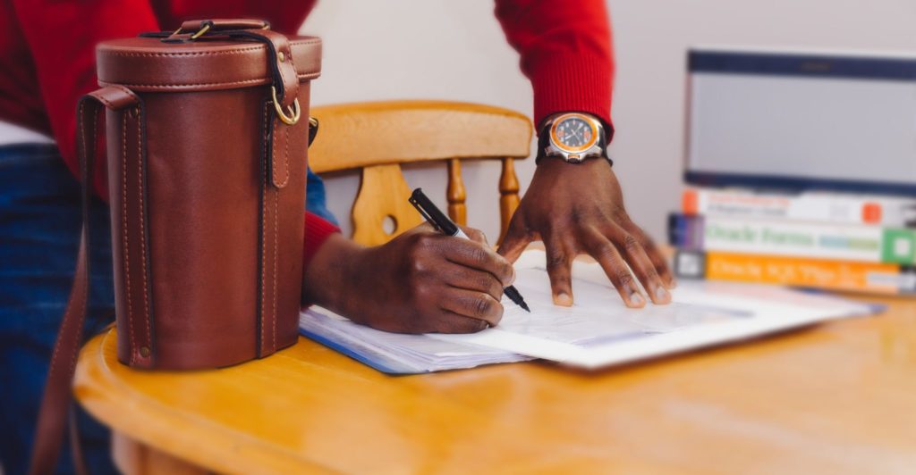 Taking notes on desk