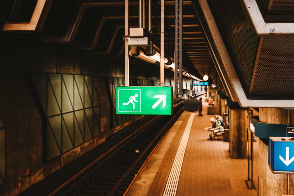 Emergency exit sign in underground station